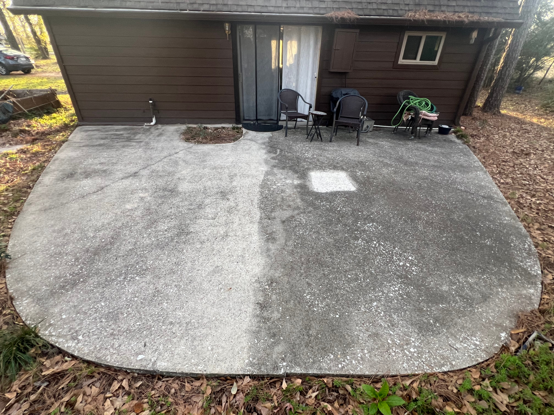 Patio at thirty months, clear contrast between sealed and unsealed halves